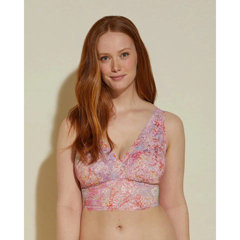 Longline plunge front wireless lace bralette designed for fuller busts with smaller bands. Printed, soft, stretch, semi-sheer, scalloped, floral Never Say Never lace. Non-padded cups lined with power mesh for support. Longline band and plunge front neckline. Hook and eye closure back and wide, adjustable straps.