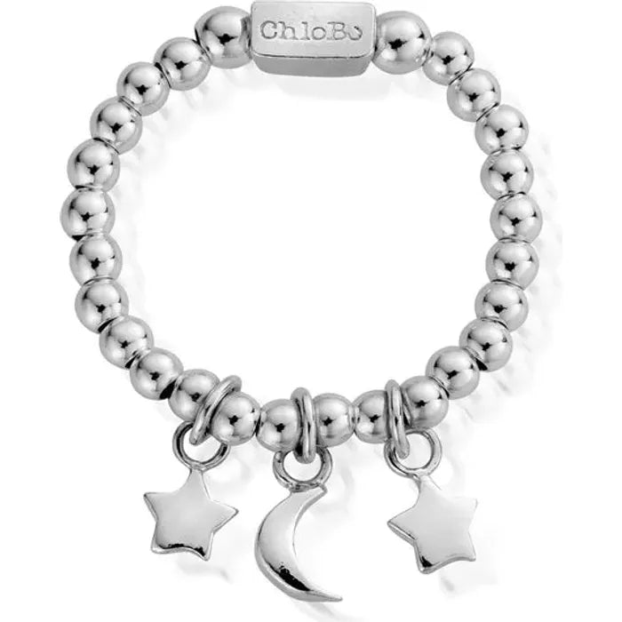 silver beaded ring with three charms - stars and moon