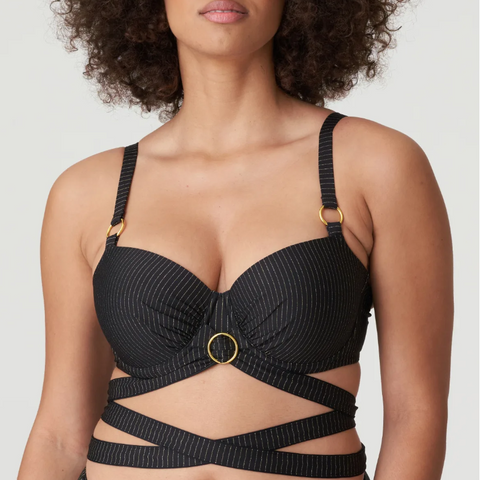 Fashionable, balcony-style bikini top with hints of glitter. The removable strap can be worn around your neck or body. Extremely feminine! Timeless black with a golden shimmer that catches the light. Chic and sophisticated!